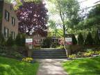 $1300 Lovely, Spacious Corner Condo w/HW Floors, Extra Storage & Parking!