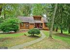 Stunning contemporary nestled in the tranquil setting of Brookwood.