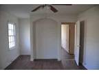 $595 / 2br - 2/1 home with faux woods,fenced yard,security system.Available now!