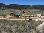 Custom Log Home on 40 acres!