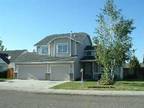 4 bedrooms, living room and family room, large fenced in yard