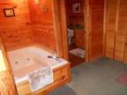 Gatlinburg 2 BR 2 BA cabin with ARCADE games, WIFI and HOT TUB