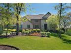 1.61 Acres of Beauty...the house & the wooded site.