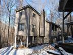 Bank Owned Contemporary mountain home on wooded lot close to Maggie Valley
