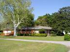 MOVE-IN READY. Large home with total accessibility on 1.3 acres