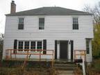 Four br Two Story Home with Hardwood Floors.