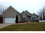 Sprawling Brick Ranch Featuring Great Room with Fireplace