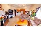 Spacious duplex with sunset and partial ocean view