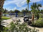 455 Golden Isles Dr #107, Hallandale Beach, FL 33009
