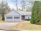 This Alpharetta cul-de-sac home offers a two-car garage
