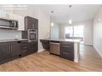 This 2 Bedroom Suite W/Open Concept Living Area...