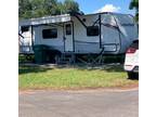 Seek RV spot electric and water hook up