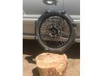 Paddle tire, black rim, sprocket and disc. Like new ready to put on bike