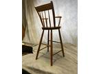 Antique Thumb back high chair for a child