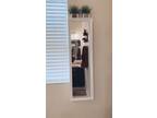 Hanging storage mirror