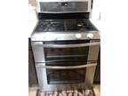 Oven, double, gas range, chrome, Whirlpool brand.