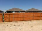 Wood fence staining and repair
