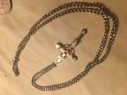 Silver chain and white gold cross