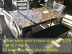 Table with Four Chairs and Bench