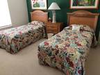 Two beds, nightstand and dresser