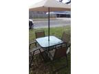 Pattio table with umbrelle
