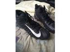 Football cleats,pads and under armor shirt