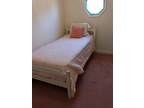 Twin bed with mattress