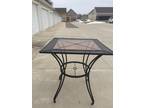 Wrought iron bar height patio tsble