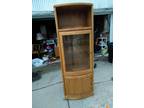 Real oak curio cabinet with glass shelves. Perfect