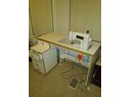 BERNINA 1530 Sewing/quilting machine w/roll away storage