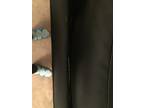 Black leather L-shaped sectional sofa w/ ottoman/storage.
