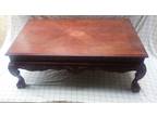 Solid wood table with claw feet