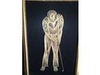 Golfer in gold thread