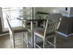 Bar height table with 4 chairs