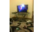 Black leather reclining living room set