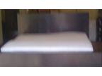 Cal King Bed with head and footboard and mini fridge