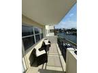 401 Golden Isles Dr #406, Hallandale Beach, FL 33009