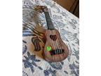 Ukulele made of 14" New Kids