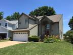 House on golf course with community pool