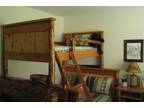 Stacked Log Bunk Bed Twin/Full - $750 (Austin)
