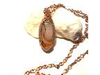 Copper Wire Wrapped Oval Volcano Cherry Quartz Pendant