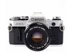 Canon AE-1 35mm Film Camera Kit With FD 50mm f/1.8 S.C Lens and Battery