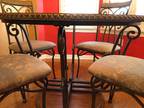 Kitchen table , chairs and baker s rack