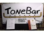 Tonebar Patent #11798519 Acoustic Guitar String Mounting System & Method No Pins