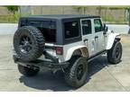 Customized 2013 Jeep Wrangler Unlimited Sport 4x4