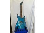 Kramer Focus 1000 1985 Metallic Teal Banana Hockey Stick Headstock Tilted Humbu