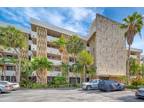 301 Golden Isles Dr #107, Hallandale Beach, FL 33009