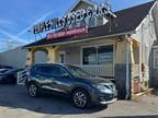 Used 2014 Nissan Rogue for sale.