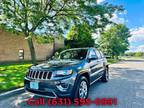 $15,900 2015 Jeep Grand Cherokee with 106,000 miles!