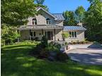 Charming 2 story stone house on 2 acre lot.